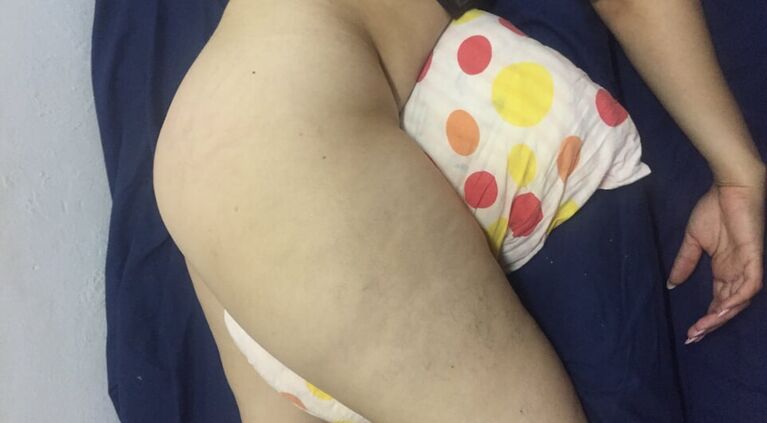 Wife licks feet and masturbates with cushion.