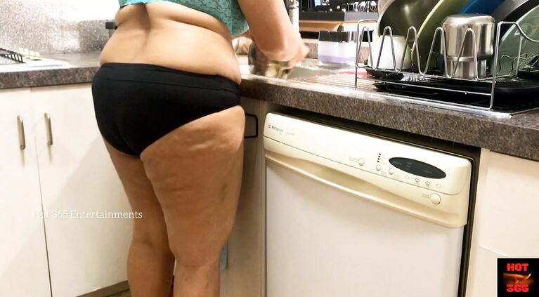 Big boobs Bhabhi in the Kitchen wearing panties and bra
